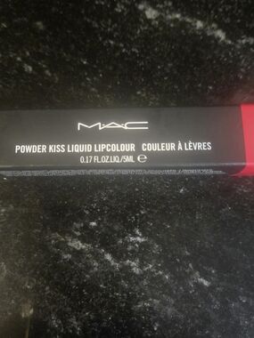 MAC Cosmetics Powder Kiss Liquid Lipcolour in vibrant red Color MaX Smash